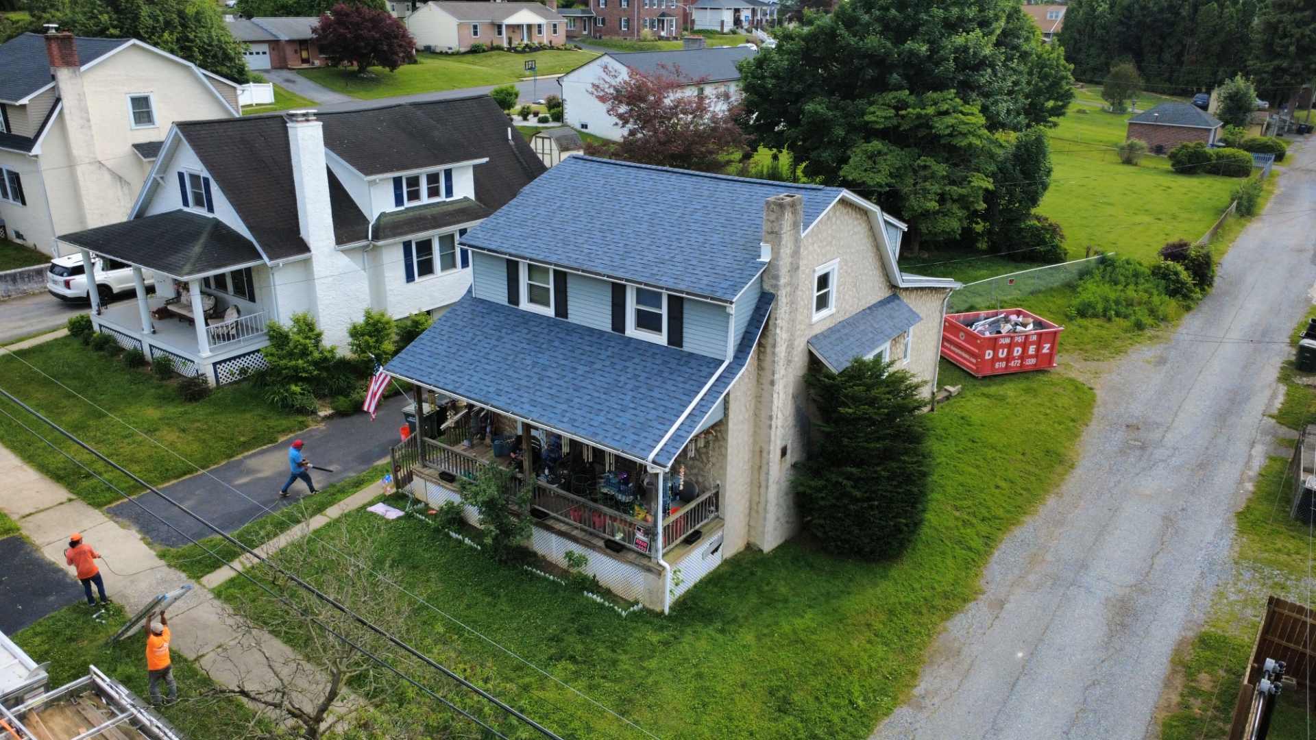 Aerial view of completed roofing project
